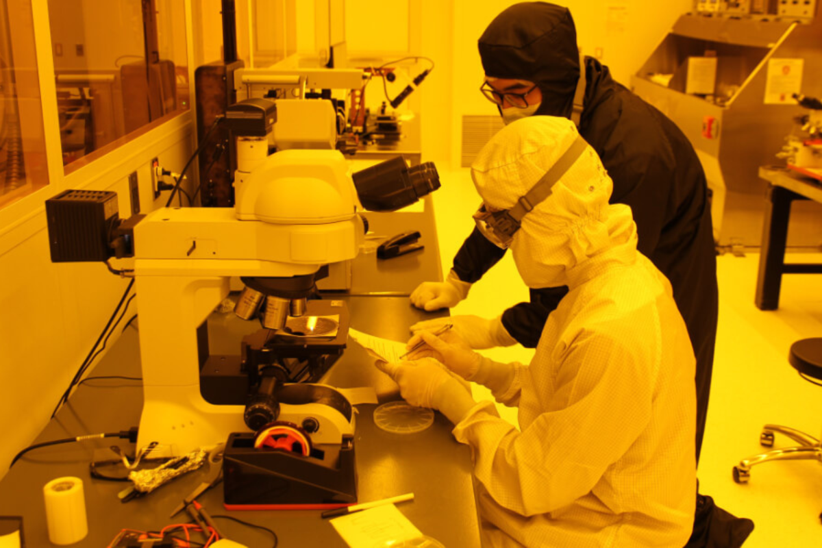 Students working in a cleanroom laboratory